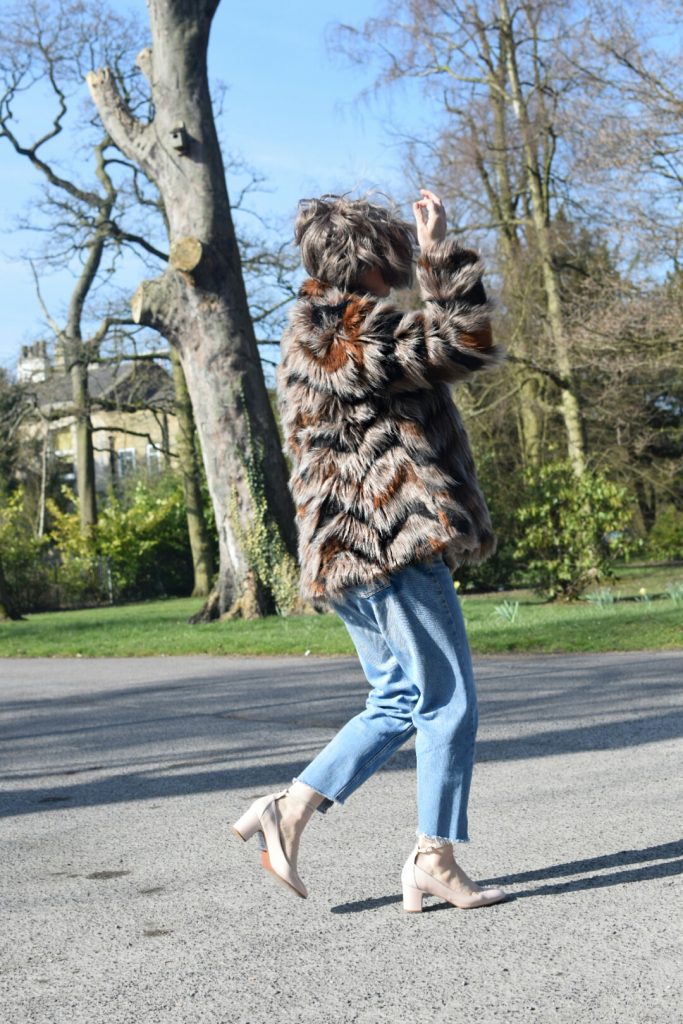 Kaleidoscope Faux Fur Coat, Topshop Highwaisted Jeans, Primark Band tee, Topshop Mary Janes Journey Shoes.